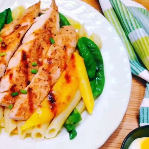 Top 5 Chicken Breakfast Recipes in 2025 7 A variety of chicken breakfast recipe dishes including Indian paratha, vegetable hash, breakfast burrito, air-fried chicken with waffles, and a quinoa bowl