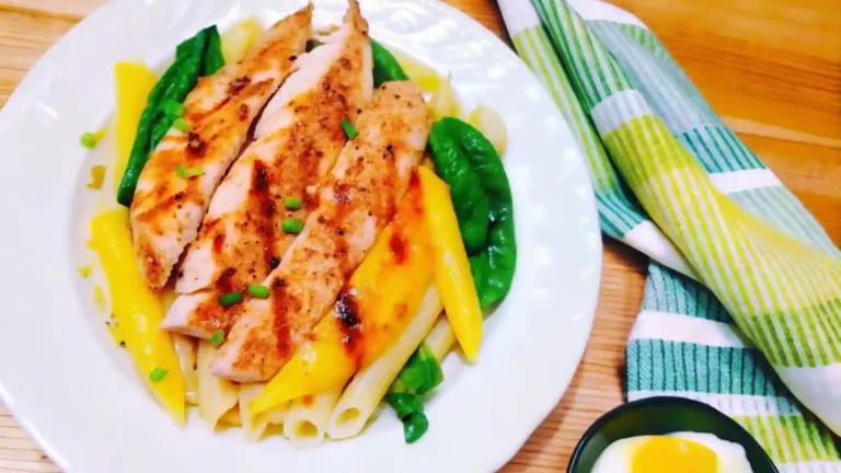 A variety of chicken breakfast recipe dishes including Indian paratha, vegetable hash, breakfast burrito, air-fried chicken with waffles, and a quinoa bowl