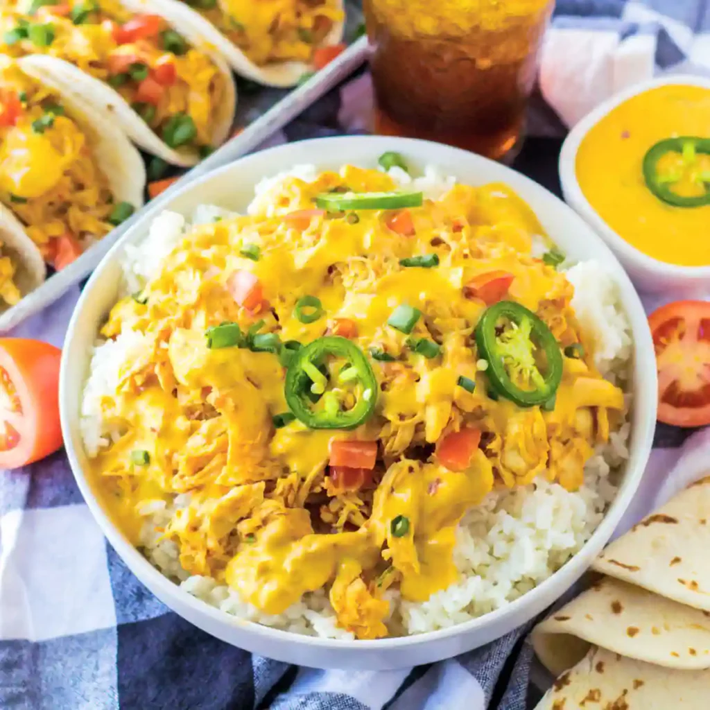  steak and queso rice in a skillet with the words steak and queso rice above it