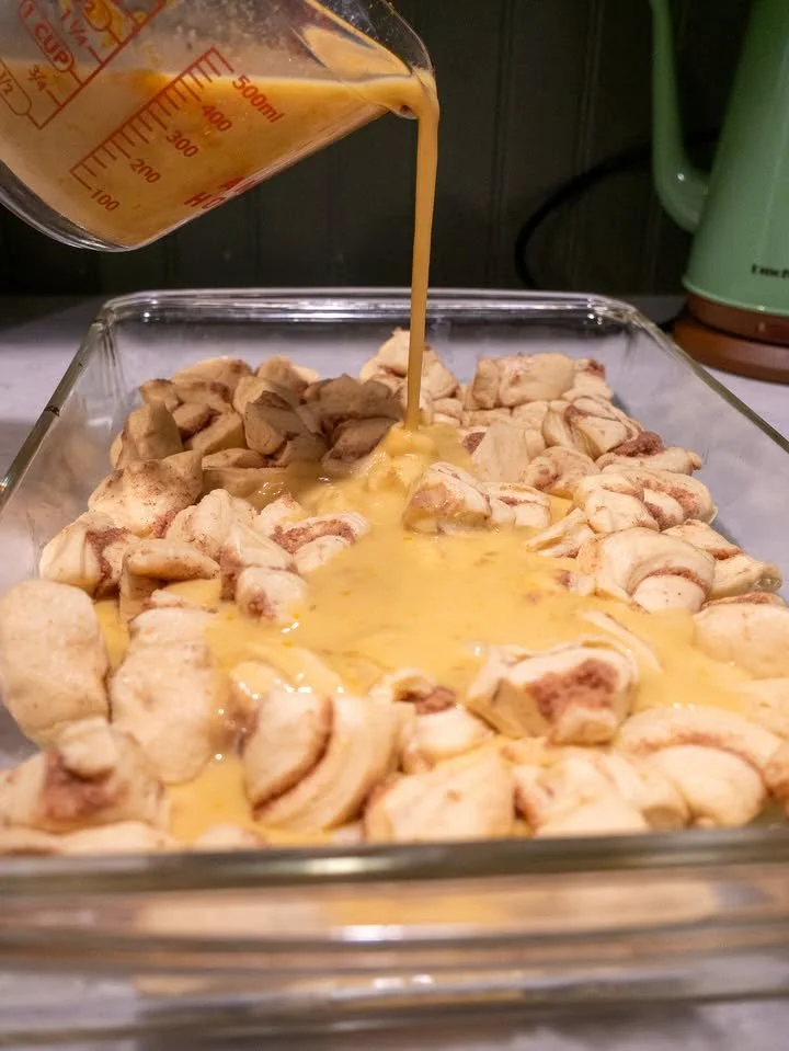 Freshly baked cinnamon rolls with creamy icing, perfect for breakfast or dessert