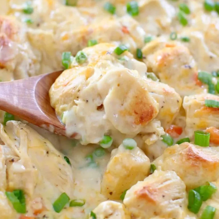 Homemade Chicken and Biscuit Casserole topped with golden biscuits