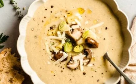 Bowl of Remy's Ratatouille Soup with fresh herbs and vegetables