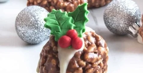 Festive Rice Krispie Christmas puddings decorated for holiday celebrations