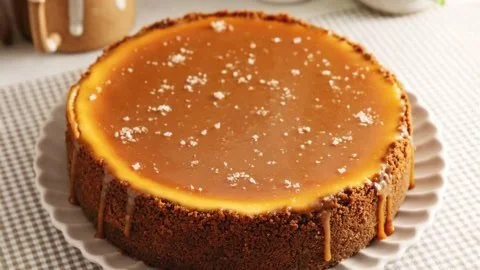 Delicious salted caramel cheesecake with a drizzle of caramel on top