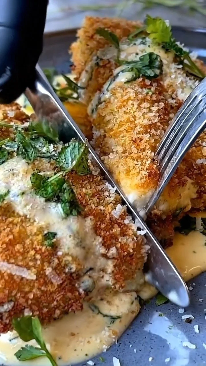 Savory pretzel-crusted chicken with cheesy mustard drizzle on a plate