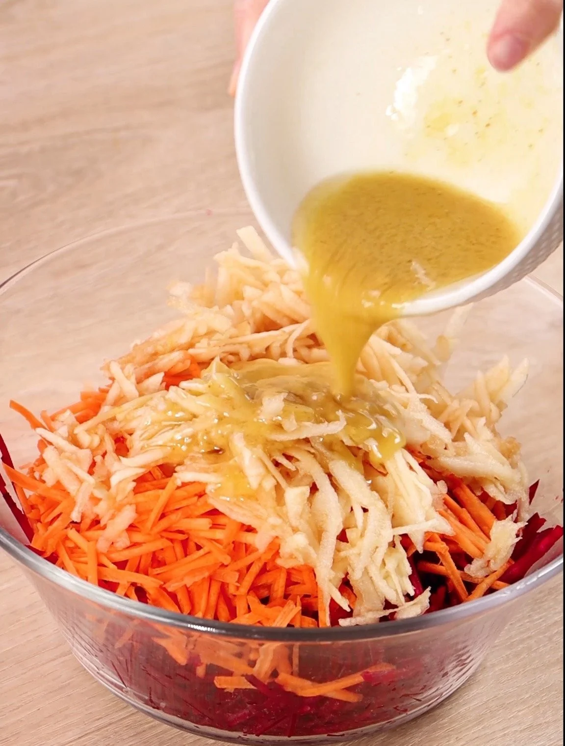Vibrant and healthy Beetroot-Carrot-Apple Salad in a bowl