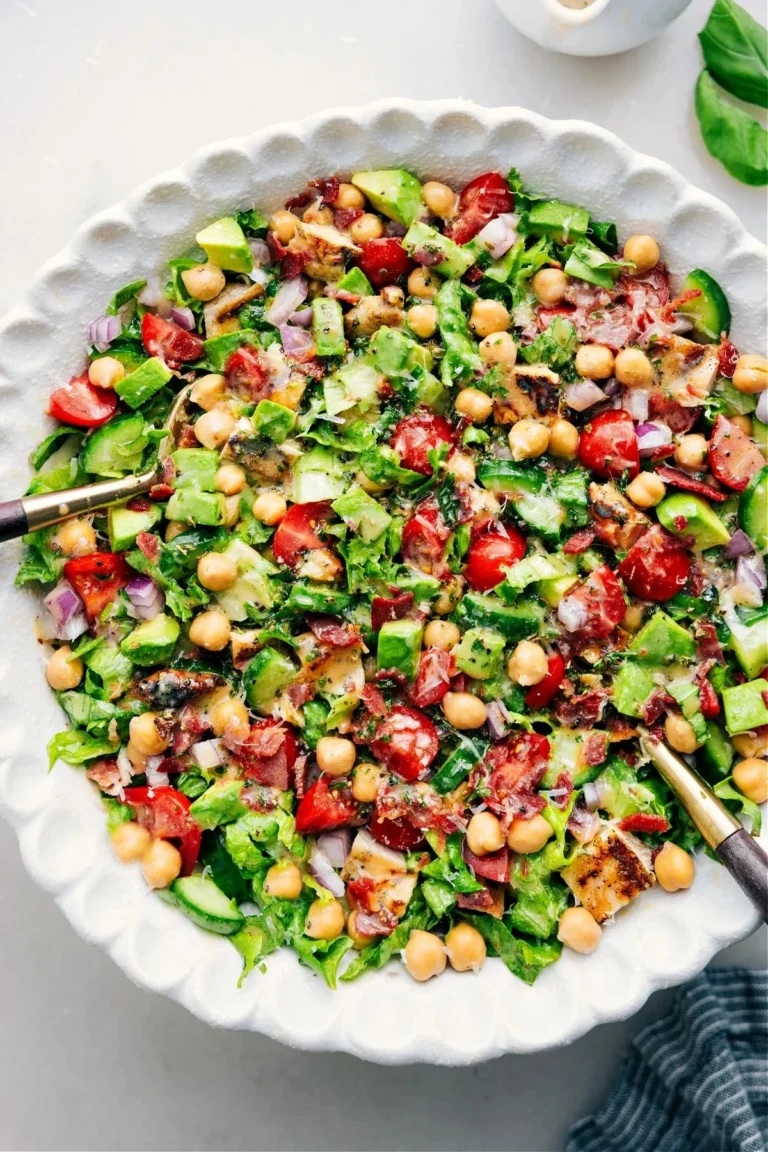 Chopped chicken salad with diced vegetables and dressing
