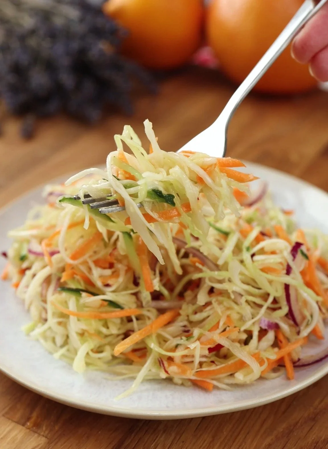 Fresh and crunchy cabbage salad in a bowl with colorful vegetables