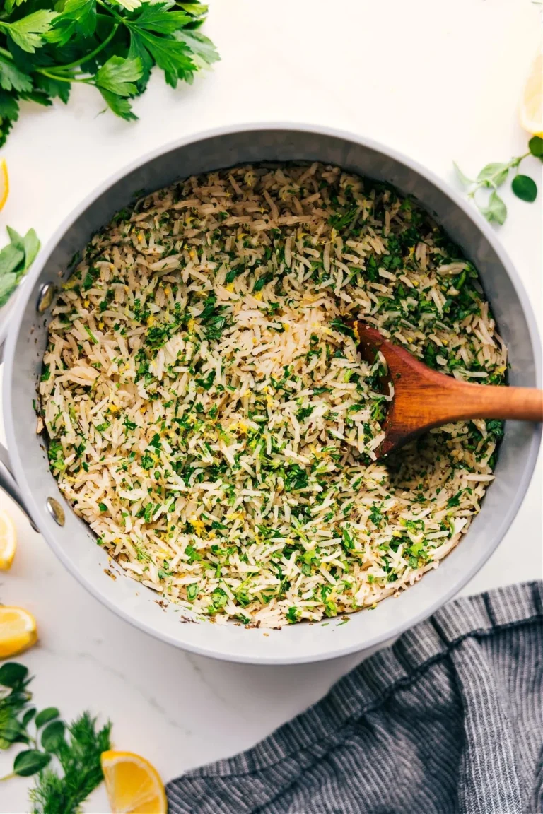 Delicious Greek rice served in a bowl with herbs and spices.