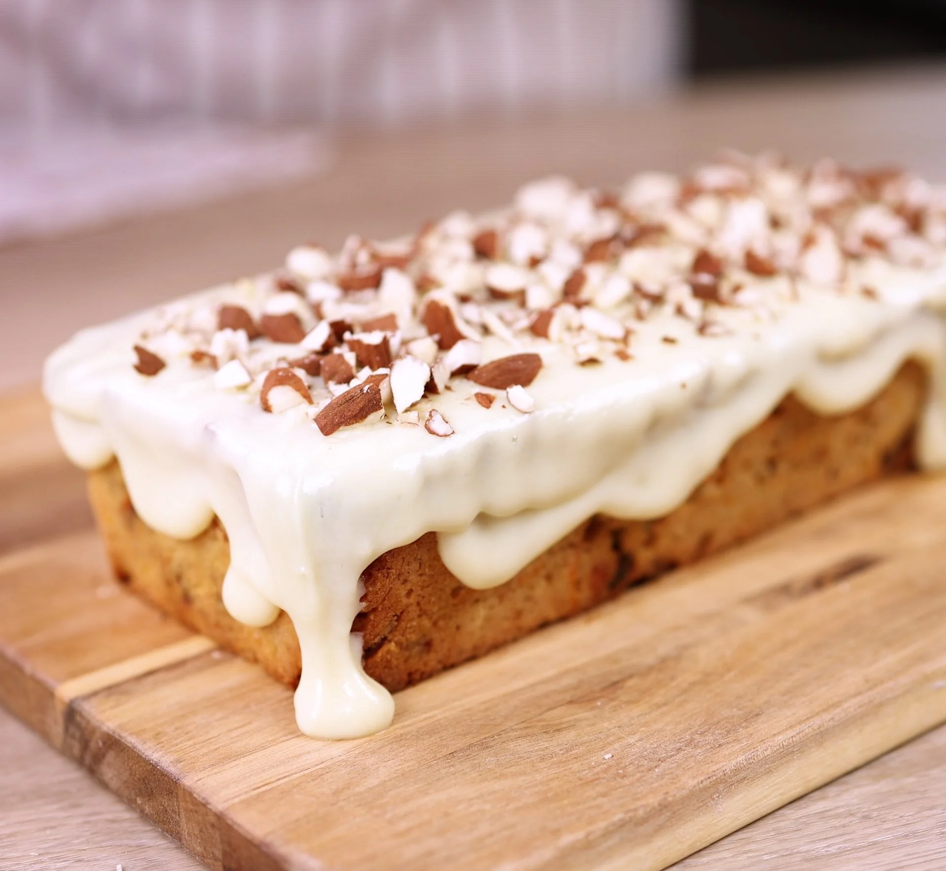 Bowl of quick oatmeal topped with apples and carrots.