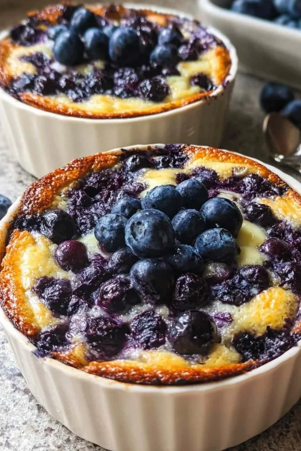 Baked blueberry cottage cheese bowls topped with fresh blueberries