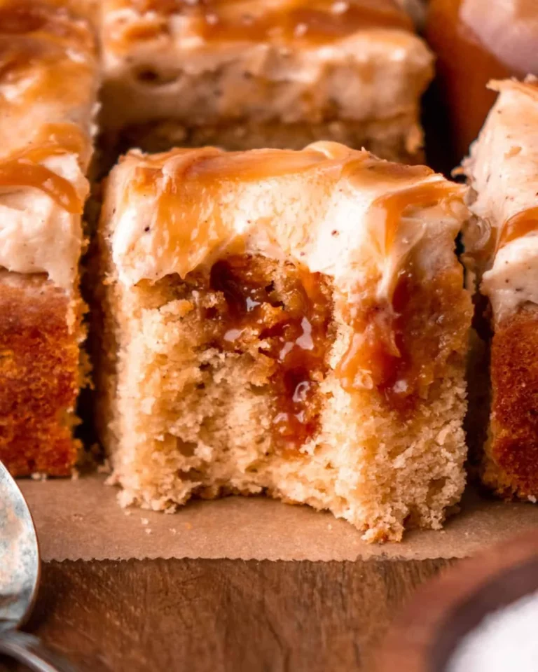 Slice of delicious Brown Butter Caramel Cake on a plate