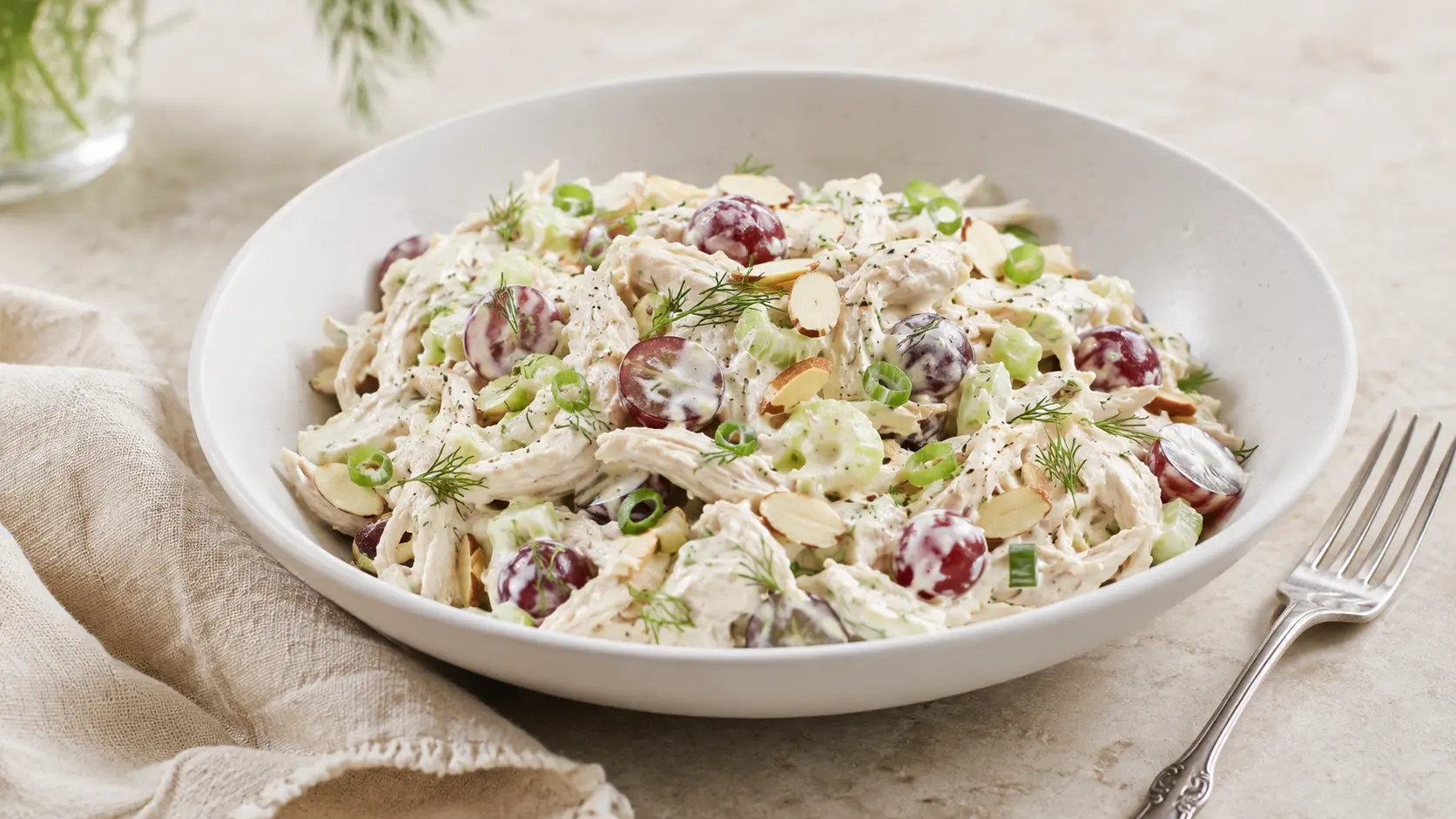 Greek yogurt chicken salad with grapes, celery, almonds, and fresh dill